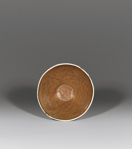 A BROWN-GLAZED MOULDED DINGYAO BOWL