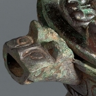 An Archaic Bronze Ritual Covered Tripod Pouring Vessel (Yi Ding)