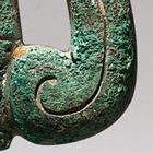 A PAIR OF ARCHAIC BRONZE HORSE BRIDLE ORNAMENTS