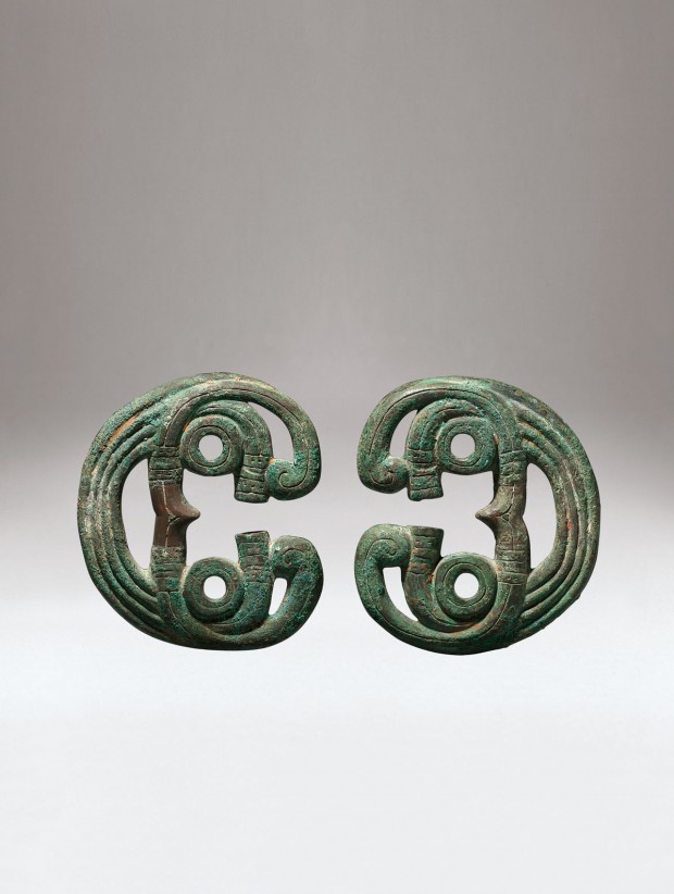 A PAIR OF ARCHAIC BRONZE HORSE BRIDLE ORNAMENTS