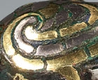 A GOLD- AND SILVER-INLAID BRONZE ‘PHOENIX’ FINIAL
