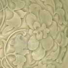 A CARVED YAOZHOU CELADON BOWL