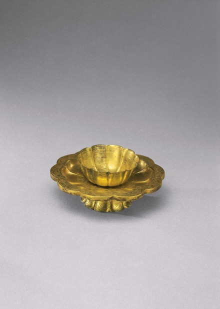A GILT-SILVER WINE CUP AND STAND