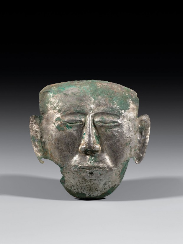 A CHASED SILVER FUNERARY MASK