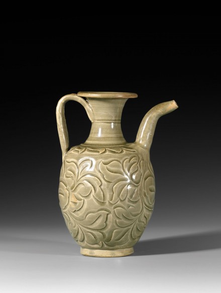 A CARVED YAOZHOU CELADON EWER