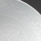 A MOULDED ‘SHUFU’ PORCELAIN SHALLOW BOWL