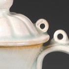 A SMALL YINGQING GLAZED PORCELAIN EWER AND COVER
