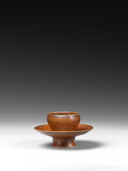 A RUSSET-BROWN GLAZED DINGYAO CUPSTAND