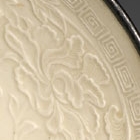 A MOULDED DINGYAO WHITE PORCELAIN BOWL