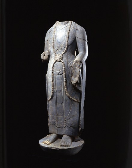 A GRAY MARBLE TORSO OF A BODHISATTVA