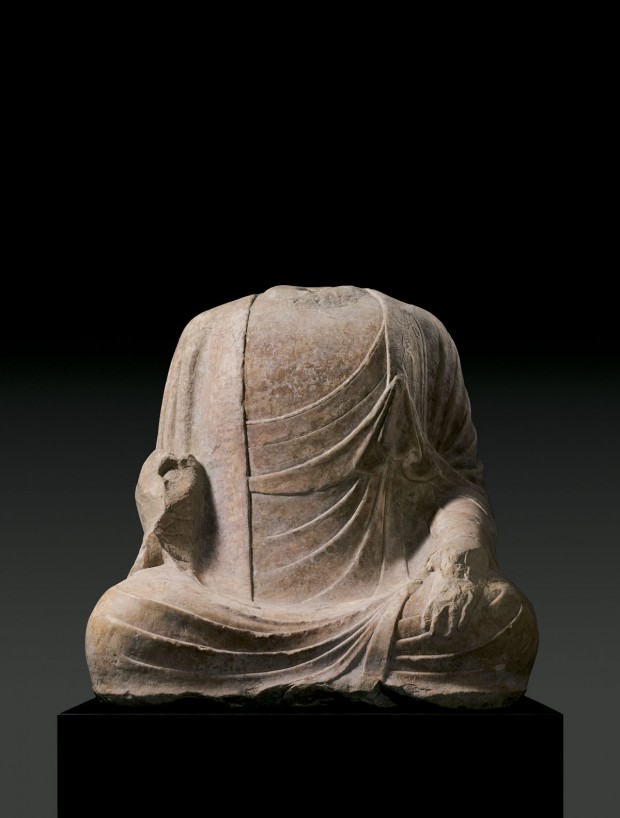 A MARBLE TORSO OF BUDDHA