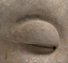 A SANDSTONE HEAD OF A BUDDHIST DISCIPLE