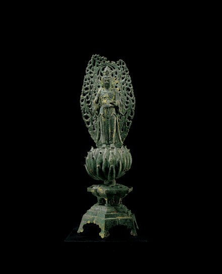 A BRONZE FIGURE OF GUANYIN ON LOTUS PEDESTAL