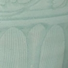 A CARVED LONGQUAN CELADON VASE