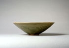 A CARVED YAOZHOU CELADON CONICAL BOWL