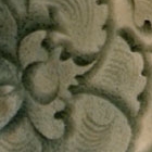 A CARVED YAOZHOU CELADON CONICAL BOWL