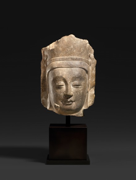 A LIMESTONE HEAD OF A BODHISATTVA