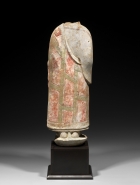 A PAINTED WHITE MARBLE TORSO OF THE BUDDHA