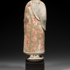 A PAINTED WHITE MARBLE TORSO OF THE BUDDHA