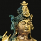 A GILT-BRONZE FIGURE OF THE BODHISATTVA GUANYIN