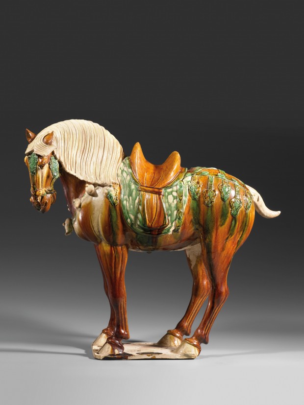 A SANCAI-GLAZED POTTERY FIGURE OF A SADDLED HORSE