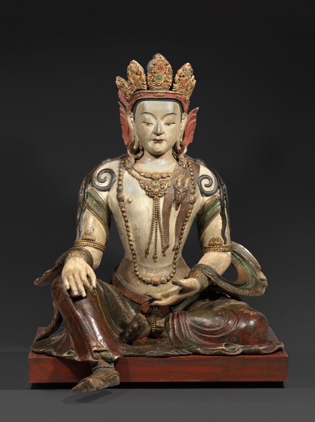 A SINO-TIBETAN PAINTED WOOD FIGURE OF A BODHISATTVA