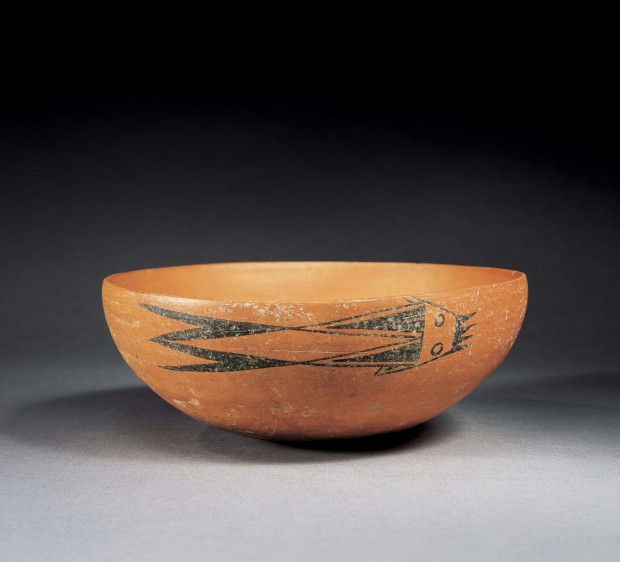 A NEOLITHIC RED POTTERY BOWL WITH PAINTED FISH DESIGN