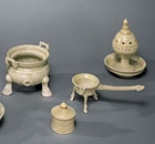 A SET OF GLAZED STONEWARE MINIATURE TOMB FURNITURE