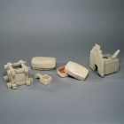 A SET OF GLAZED STONEWARE MINIATURE TOMB FURNITURE