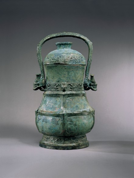 AN ARCHAIC BRONZE WINE VESSEL AND COVER (YOU)