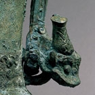 AN ARCHAIC BRONZE WINE VESSEL AND COVER (YOU)