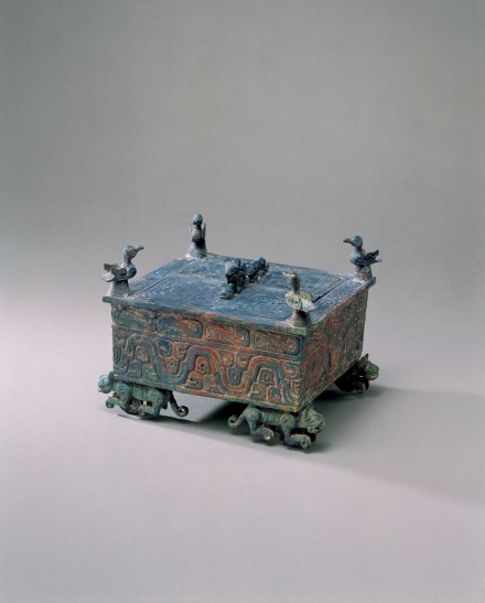 AN ARCHAIC BRONZE BOX ON WHEELED TIGERS