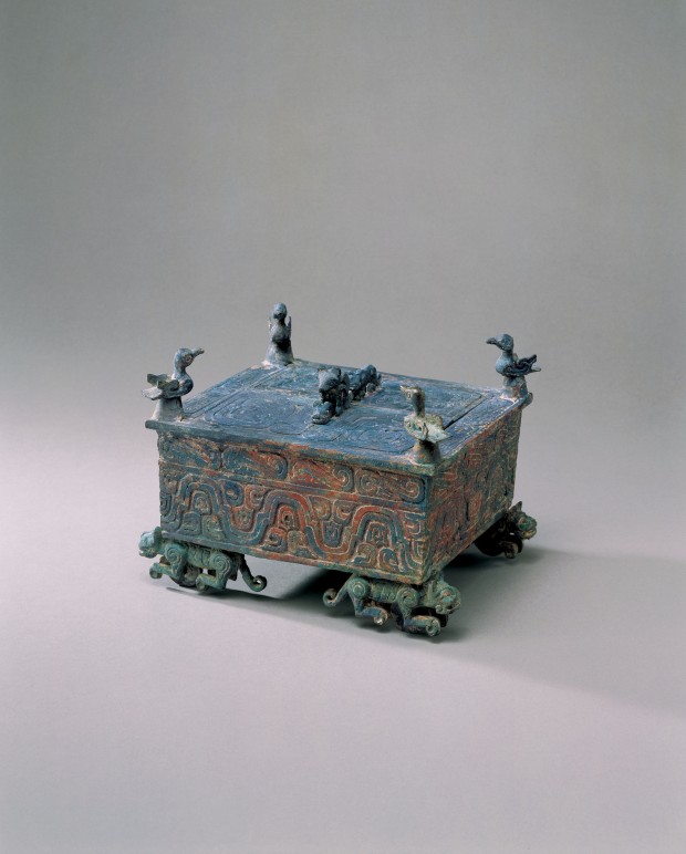 AN ARCHAIC BRONZE BOX ON WHEELED TIGERS