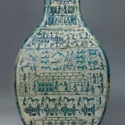 A LARGE ARCHAIC BRONZE WINE JAR WITH PICTORIAL DECORATION (FANGHU)