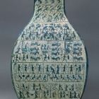 A LARGE ARCHAIC BRONZE WINE JAR WITH PICTORIAL DECORATION (FANGHU)