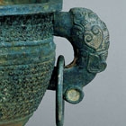 A LARGE ARCHAIC BRONZE WATER BASIN (JIAN)