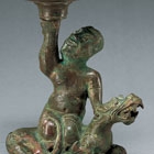 A BRONZE BOSHANLU CENSER AND COVER ON FIGURAL BASE