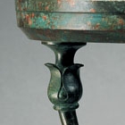 AN ARCHAIC BRONZE LAMP