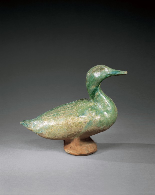 A LARGE IRIDESCENT GREEN-GLAZED POTTERY FIGURE OF A DUCK