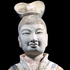 A LARGE PAINTED POTTERY FIGURE OF A COURT DIGNITARY