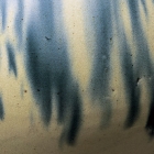 A BLUE-SPLASHED WHITE-GLAZED POTTERY JAR