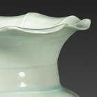 A QINGBAI GLAZED PORCELAIN VASE WITH FOLIATE RIM