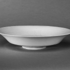 A CARVED DINGYAO WHITE PORCELAIN DISH