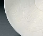 A LARGE CARVED DINGYAO WHITE PORCELAIN FOLIATE BOWL