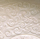 A MOULDED DINGYAO WHITE PORCELAIN FOLIATE DISH