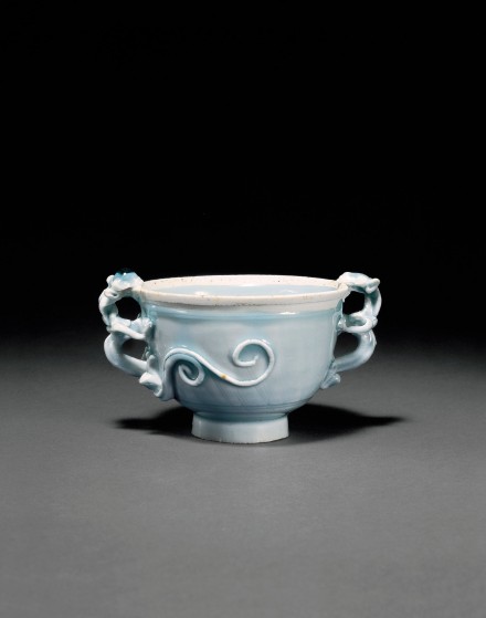 A YINGQING GLAZED PORCELAIN DRAGON-HANDLED WINECUP