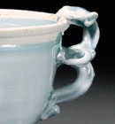 A YINGQING GLAZED PORCELAIN DRAGON-HANDLED WINECUP