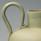 A YUE WARE EWER WITH ENGRAVED DECORATION