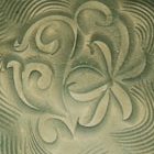 A CARVED YAOZHOU CELADON BOWL