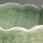 A CARVED LONGQUAN CELADON BOWL